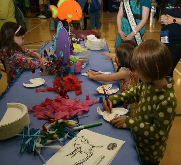 Kids visit one of the many interactive booths at World Oceans Day 2013 celebrations in St. John's © World Oceans Day Committee. 