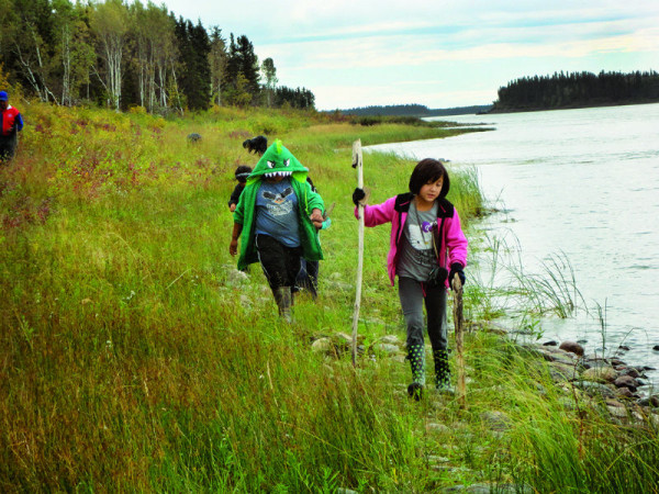 Neizha on a nature walk with classmates © Deh Gáh Elementary and Secondary School