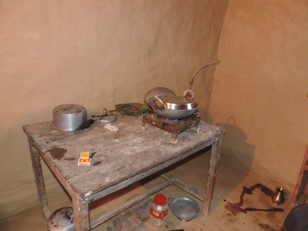 A kitchen with biogas. The flame burns clean and blue. © Heather Crochetiere