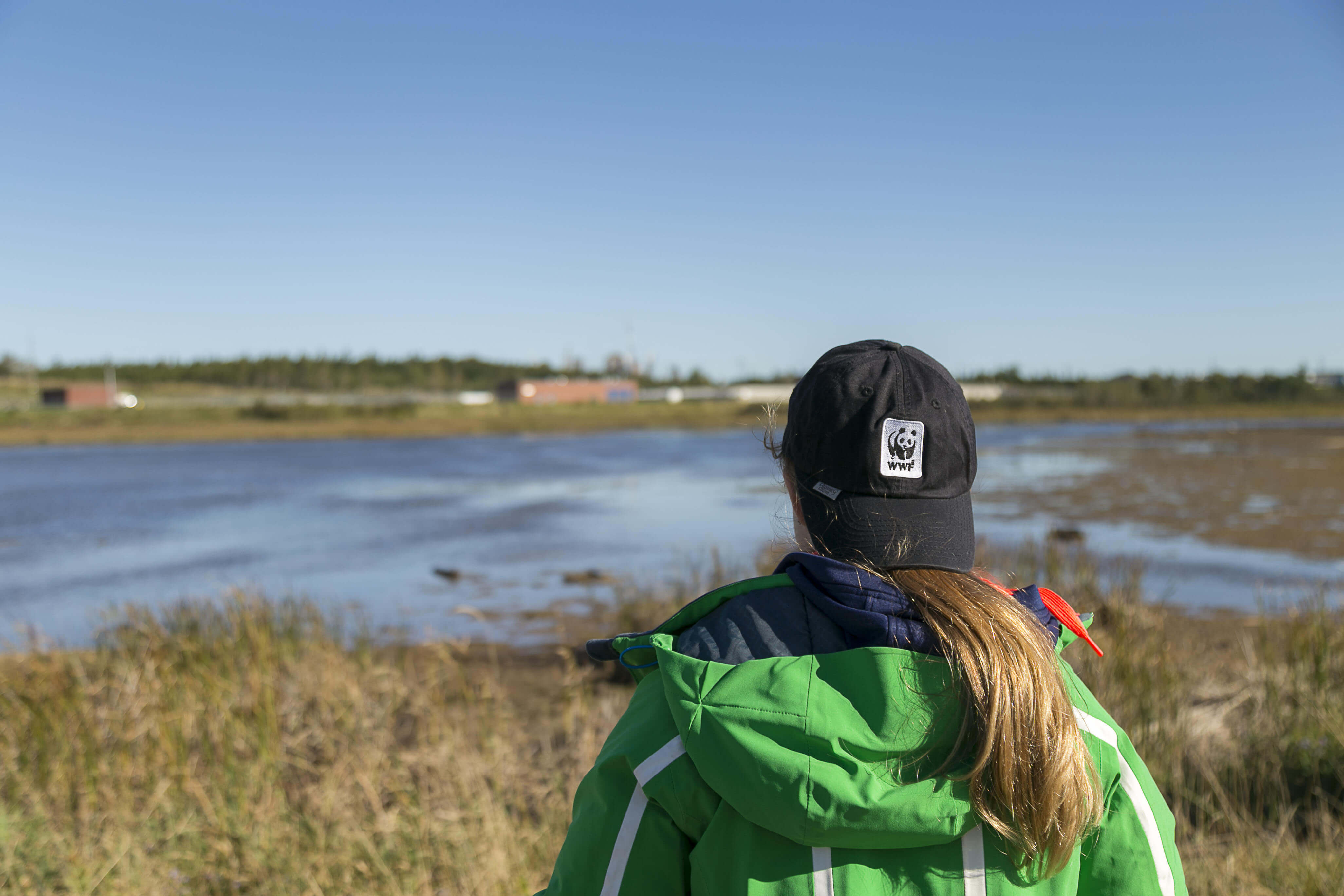 Woman looking at Saint John River