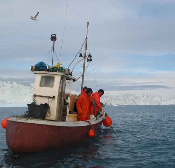 Fisherman on boat in Arctic Waters