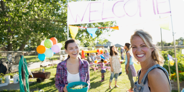 Smiling individuals at a fundraising event