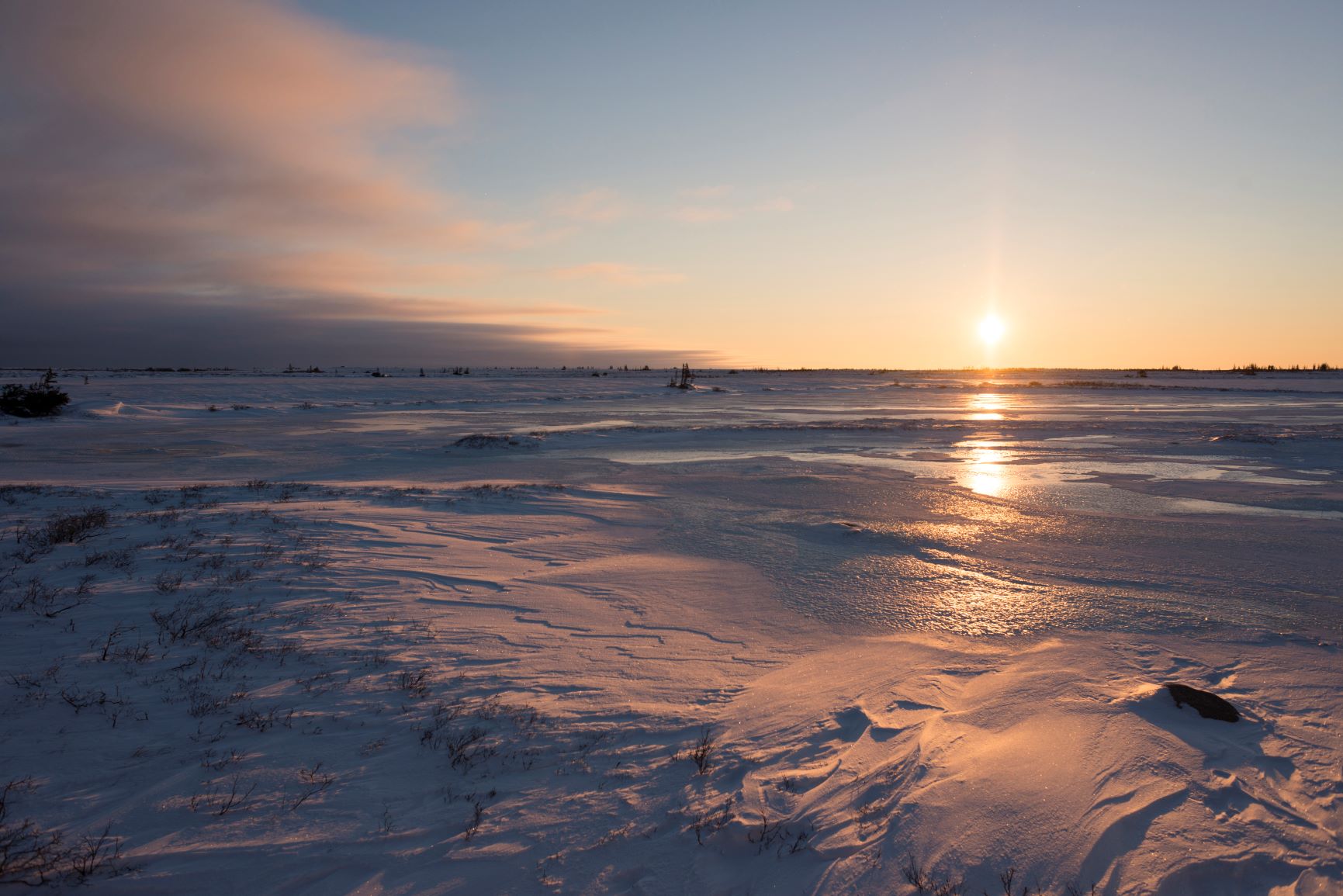 Sunrise over icy landscape in Churchill