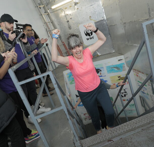 Woman in a pink shirt at the CN Tower Climb finish line